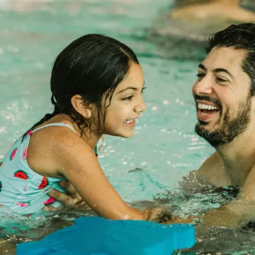 Daughter and Father in Pool