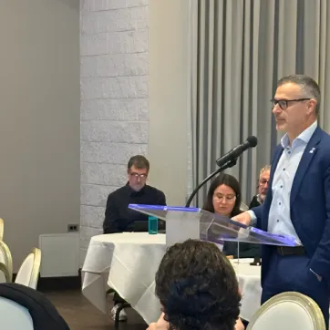 : YMCA Hamilton|Burlington|Brantford CEO Manny Figueiredo addresses provincial leaders and Hamilton stakeholders during the 2026 Ontario Budget Consultation in Hamilton.