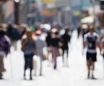 Out of focus people walking