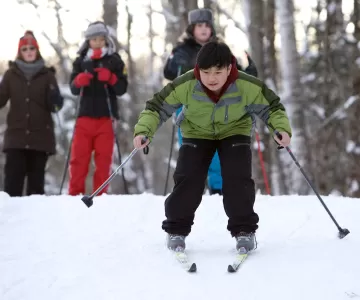Youth boy cross country skiing