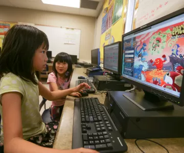 Child using computer for learning