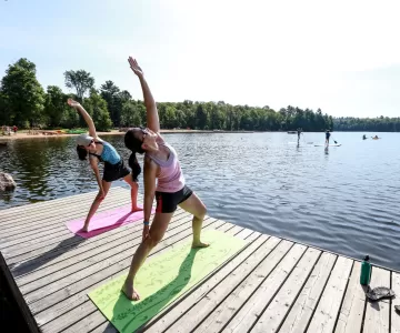 People Stretching on Dock at YMCA Wanakita
