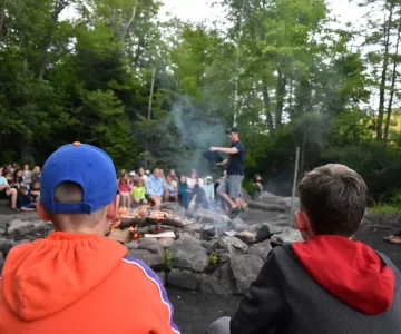 Reading of the charter around the campfire