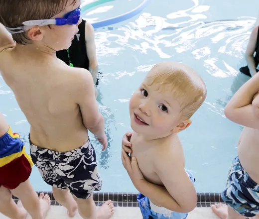 Group of swimmers participating in swim lessons