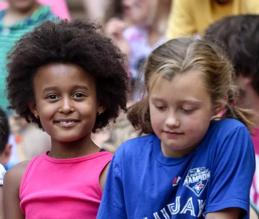 Two female Wanakita campers smiling at camera