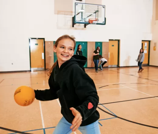 Girl_Playing_Basketball