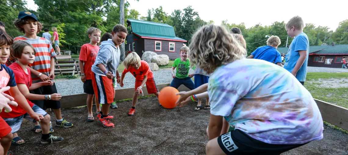 Day Camp children playing dodge ball