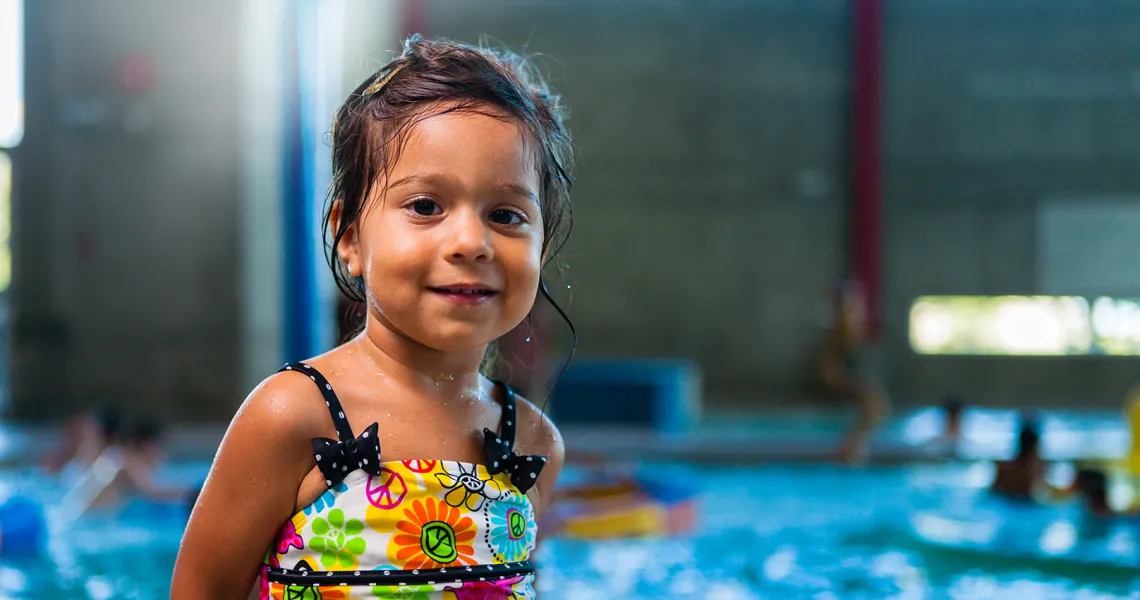 Female child participating in swim lessons