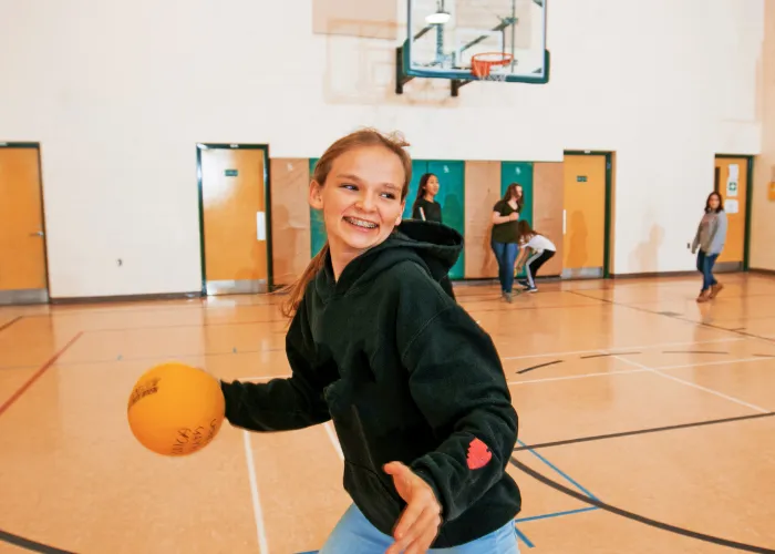 Girl playing in gym