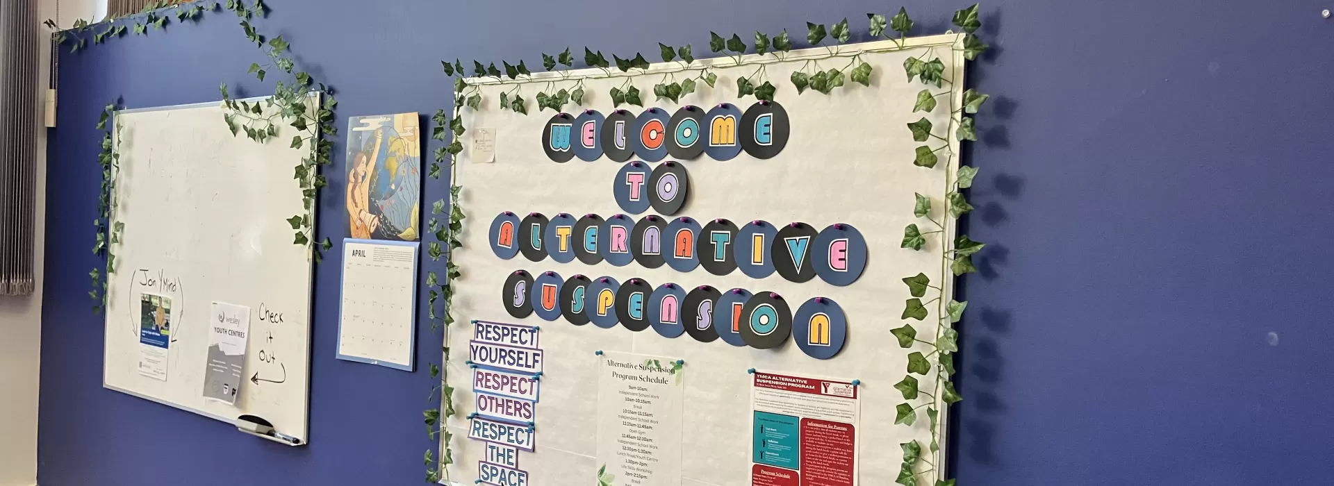 Alternative suspension program activity board in work room