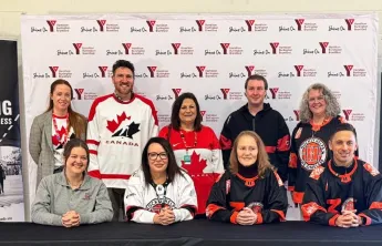 Front: Emma Langlois from Hockey Helps the Homeless, Genevieve Hladysh VP Health Fitness, Aquatics and Men's Residence, Geraldine Heaney, Olympian, and 
