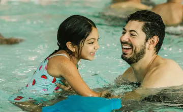Daughter and Father in Pool