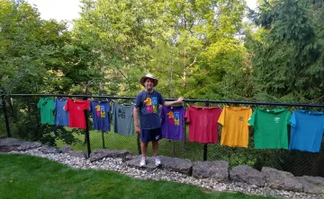 Matt Fox with his Wanakita staff and camp shirts