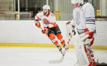 Hockey player skating on the ice