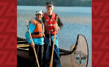 john_and_anne_marie_wilson_-_work_weekend_volunteers_paddle_voyageur_canoe